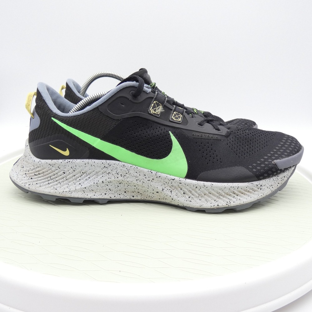 Nike Black Athletic Running Shoes with Bright Green Swoosh